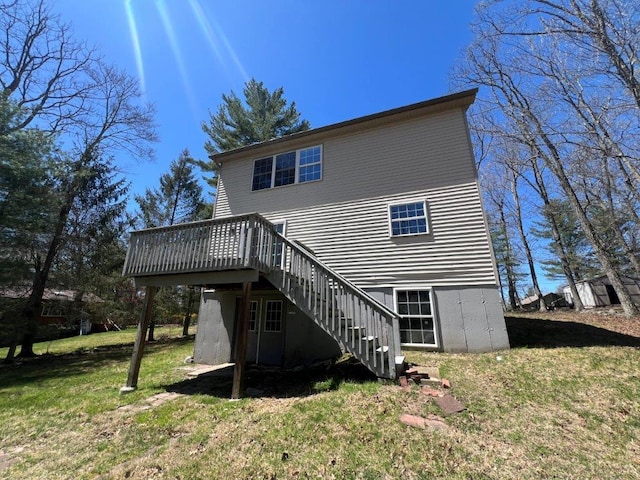 11 Willow Ln, Glen Spey, NY 12737 - rear view of property featuring stairs, a deck, and a lawn