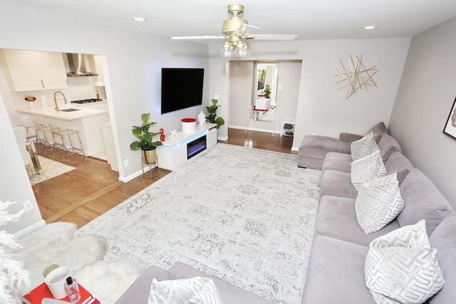 100 Dowd St Unit C12, Haverstraw, NY 10927 - living room featuring wood finished floors, ceiling fan, recessed lighting, and baseboards