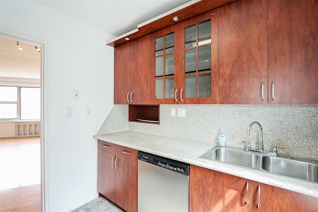 7445 Yellowstone Blvd Unit 5C, Rego Park, NY 11374 - kitchen with dishwasher, a sink, light countertops, and backsplash