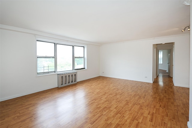 7445 Yellowstone Blvd Unit 5C, Rego Park, NY 11374 - empty room featuring light wood finished floors and baseboards