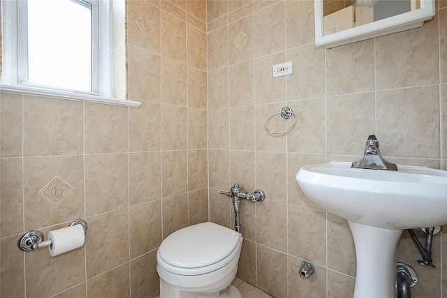 7445 Yellowstone Blvd Unit 5C, Rego Park, NY 11374 - half bathroom with tile walls and toilet