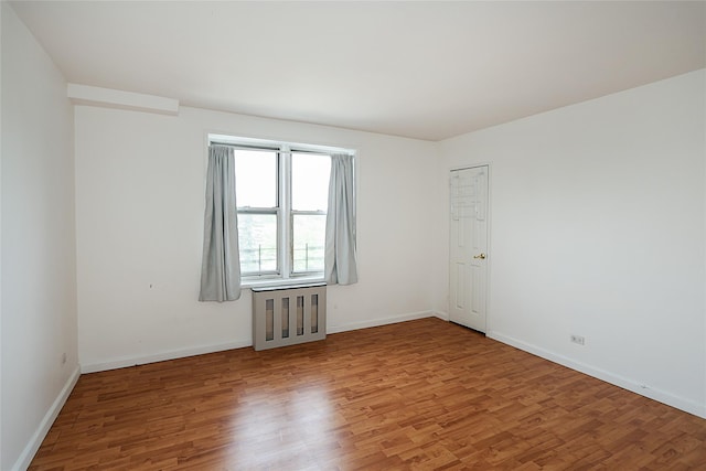 7445 Yellowstone Blvd Unit 5C, Rego Park, NY 11374 - empty room featuring wood finished floors and baseboards