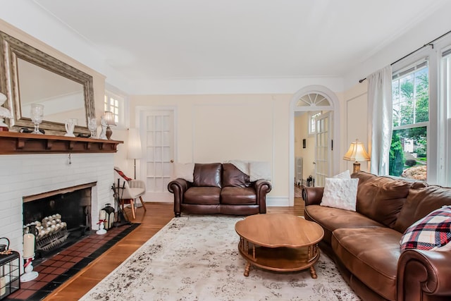 37 Lee Ave, Yonkers, NY 10705 - living room featuring wood finished floors and a brick fireplace