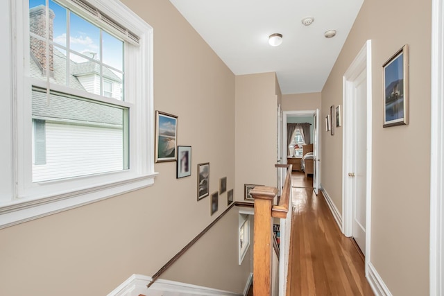 37 Lee Ave, Yonkers, NY 10705 - hallway featuring an upstairs landing, wood finished floors, and baseboards