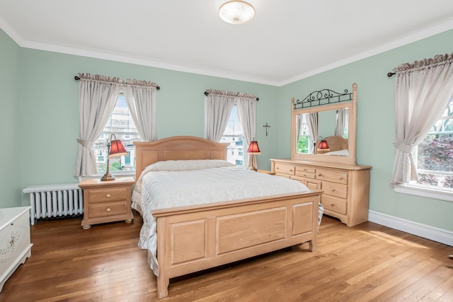 37 Lee Ave, Yonkers, NY 10705 - bedroom with radiator, light wood-style flooring, crown molding, and baseboards