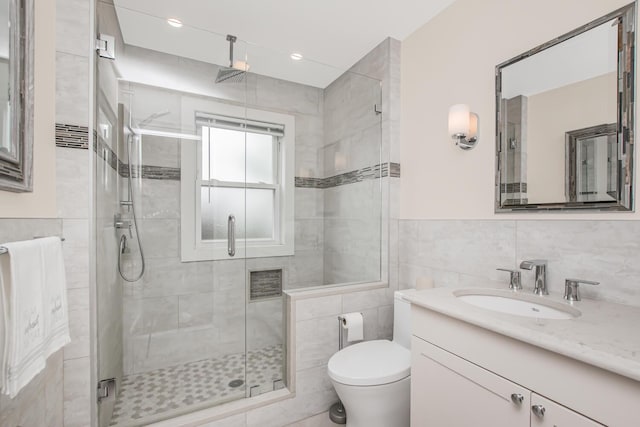 37 Lee Ave, Yonkers, NY 10705 - bathroom featuring tile walls, toilet, a shower stall, and vanity