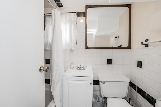 37 Lee Ave, Yonkers, NY 10705 - full bathroom featuring a sink, tile walls, toilet, tasteful backsplash, and shower / bath combo