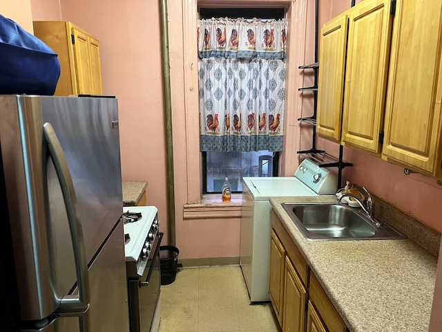 79 Hamilton Pl Unit 5, New York Manhattan, NY 10031 - kitchen featuring freestanding refrigerator, white gas range oven, light countertops, and light floors