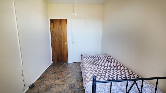 99-72 66rd Unit 7Aa, Rego Park, NY 11374 - bedroom featuring stone finish flooring and baseboards