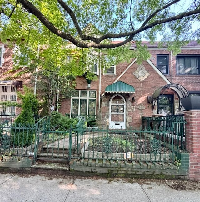 172-18 111th Ave, Jamaica, NY 11433 - view of front of home with a fenced front yard and brick siding