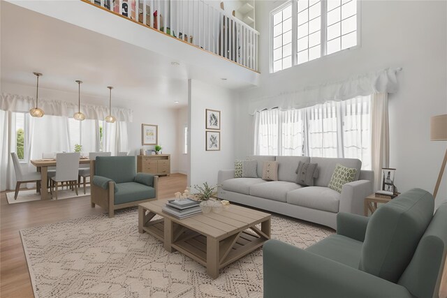 849 E Bay Dr, West Islip, NY 11795 - living room with light wood finished floors and a high ceiling