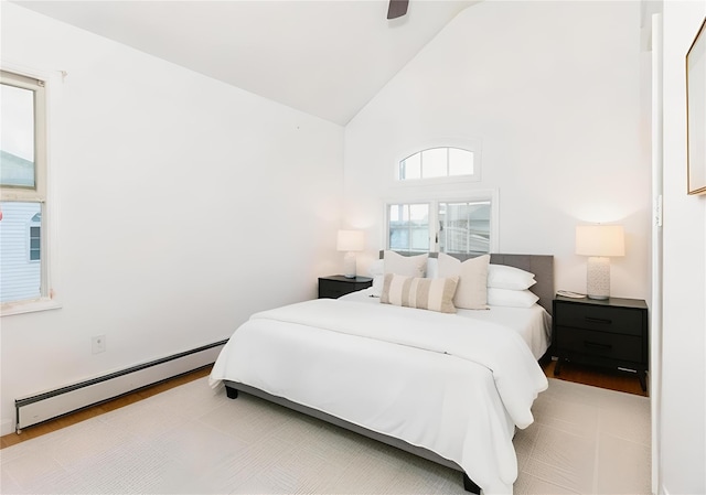 849 E Bay Dr, West Islip, NY 11795 - bedroom featuring baseboard heating, wood finished floors, high vaulted ceiling, and a ceiling fan