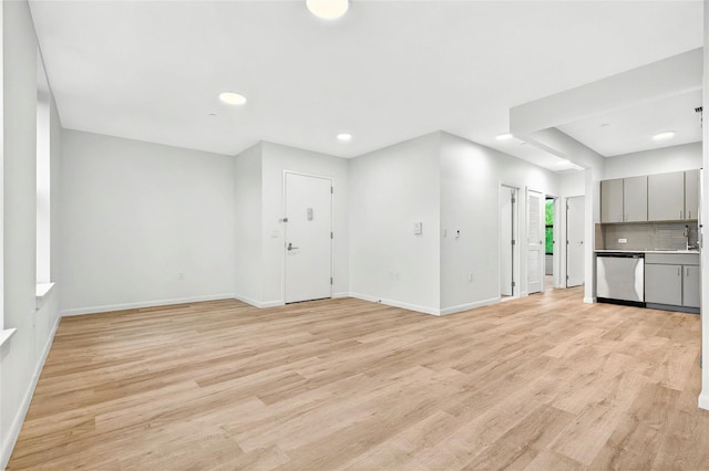 1727 Lacombe Ave Unit 2B, Bronx, NY 10473 - unfurnished living room featuring light wood-style flooring and recessed lighting