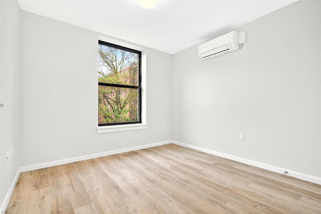 1727 Lacombe Ave Unit 2B, Bronx, NY 10473 - empty room featuring wood finished floors and an AC wall unit