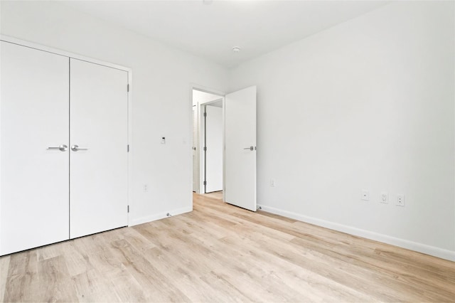 1727 Lacombe Ave Unit 2B, Bronx, NY 10473 - unfurnished bedroom with light wood-style floors and a closet