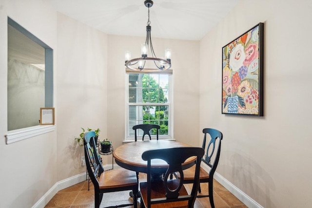 76 Sagamore Dr, Plainview, NY 11803 - dining space featuring a chandelier and baseboards