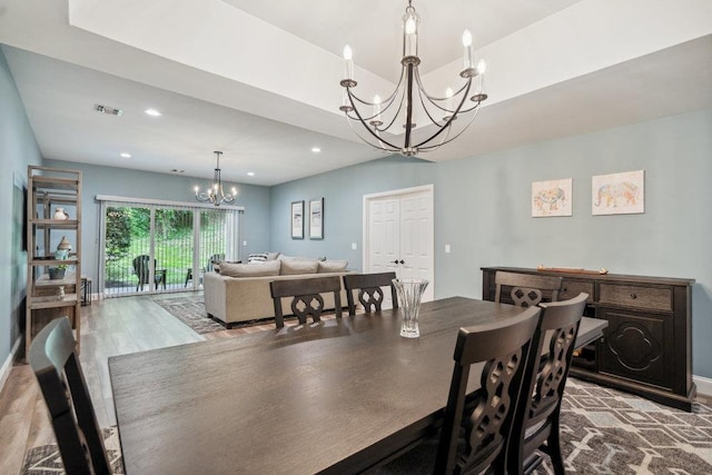 76 Sagamore Dr, Plainview, NY 11803 - dining area with a chandelier, wood finished floors, recessed lighting, and baseboards