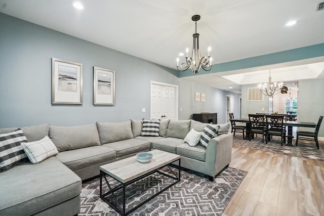76 Sagamore Dr, Plainview, NY 11803 - living area featuring a chandelier, wood finished floors, and recessed lighting