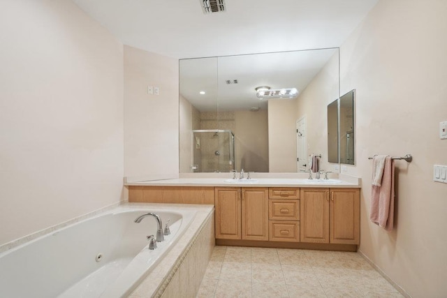 76 Sagamore Dr, Plainview, NY 11803 - full bath with a shower stall, a jetted tub, double vanity, and tile patterned flooring