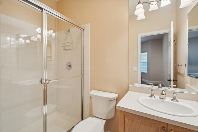 76 Sagamore Dr, Plainview, NY 11803 - bathroom featuring toilet, vanity, and a shower stall