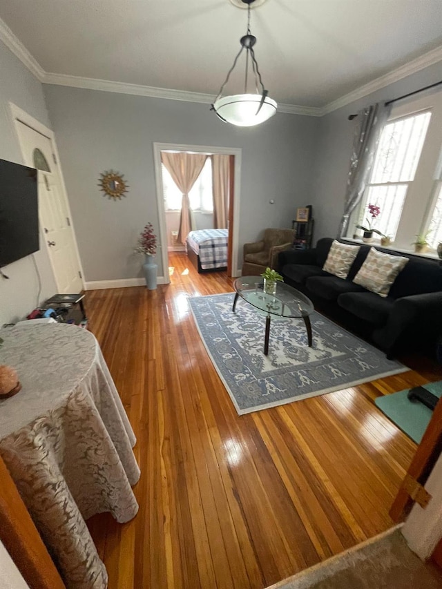 108-41 51st Ave, Corona, NY 11368 - living room featuring hardwood / wood-style floors, crown molding, and baseboards