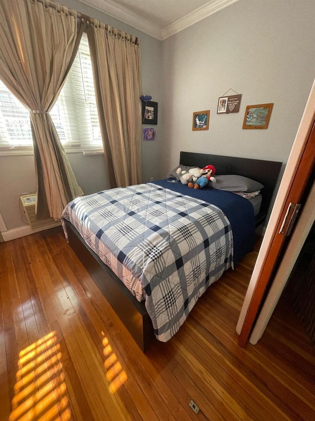 108-41 51st Ave, Corona, NY 11368 - bedroom featuring wood-type flooring, ornamental molding, and baseboards