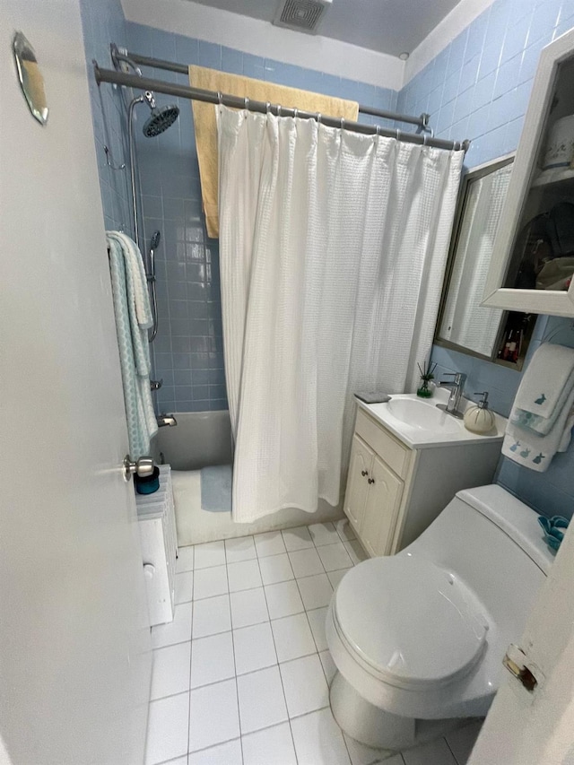 108-41 51st Ave, Corona, NY 11368 - bathroom with toilet, shower / bath combination with curtain, vanity, and tile patterned flooring