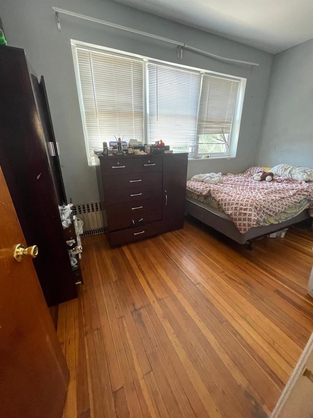 108-41 51st Ave, Corona, NY 11368 - bedroom with hardwood / wood-style flooring and radiator