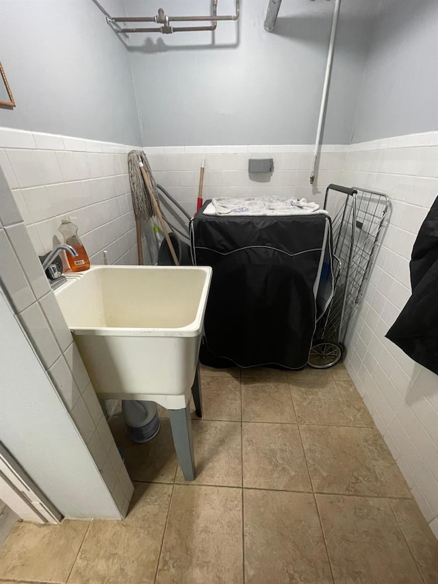 108-41 51st Ave, Corona, NY 11368 - bathroom with tile walls, tile patterned flooring, and a wainscoted wall