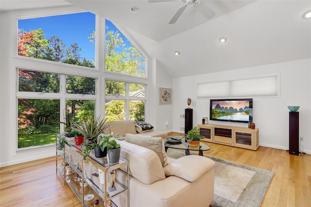 1 Exeter Pl, Glen Head, NY 11545 - living room with high vaulted ceiling, ceiling fan, wood finished floors, recessed lighting, and baseboards