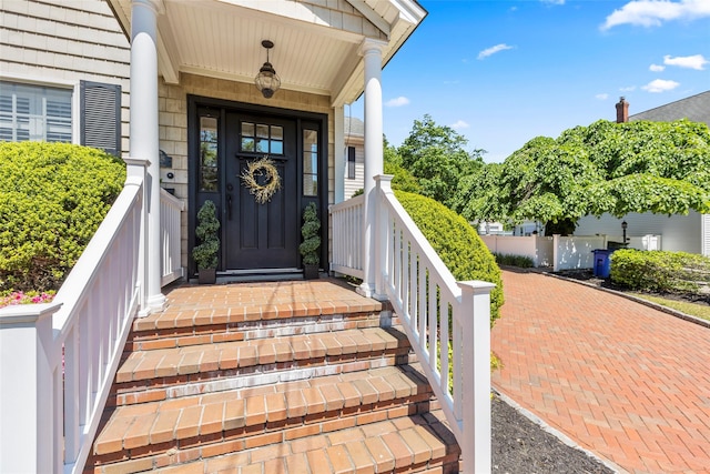 doorway to property featuring a porch