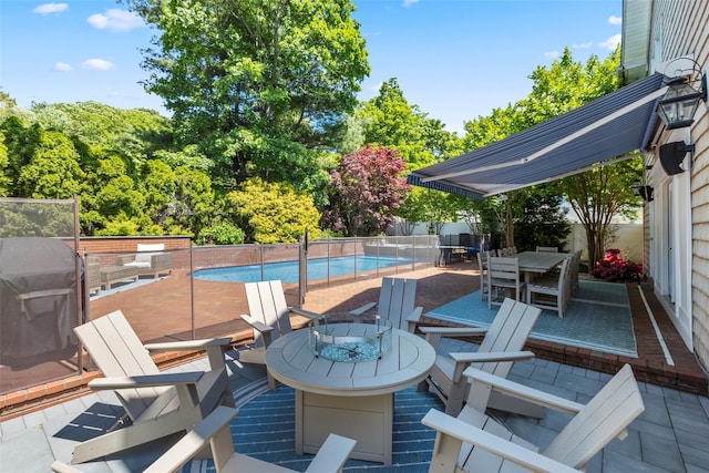 deck featuring a fenced backyard, outdoor dining area, and a patio