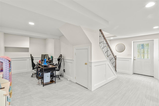 home office with carpet, recessed lighting, a decorative wall, and wainscoting