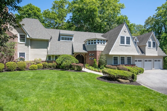 7 Cedar Ln, Glen Cove, NY 11542 - shingle-style home with driveway and a front yard