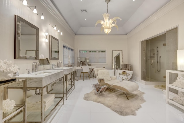7 Cedar Ln, Glen Cove, NY 11542 - bathroom with a chandelier, a soaking tub, a stall shower, double vanity, and ornamental molding