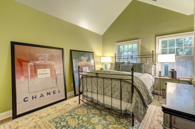 7 Cedar Ln, Glen Cove, NY 11542 - bedroom featuring baseboards and high vaulted ceiling