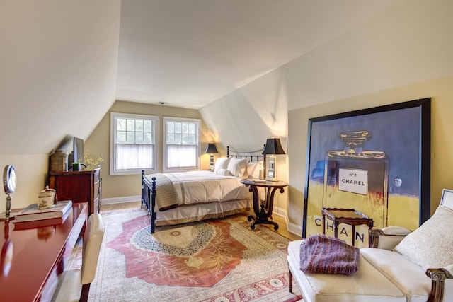 7 Cedar Ln, Glen Cove, NY 11542 - bedroom with vaulted ceiling and wood finished floors