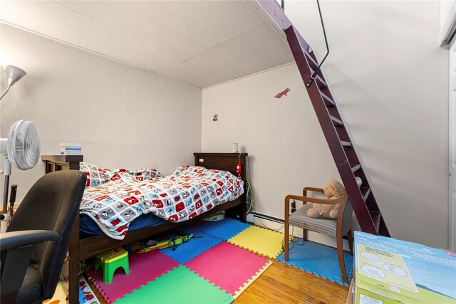 120-15 Cove Ct Unit 90A, College Point, NY 11356 - bedroom with wood finished floors