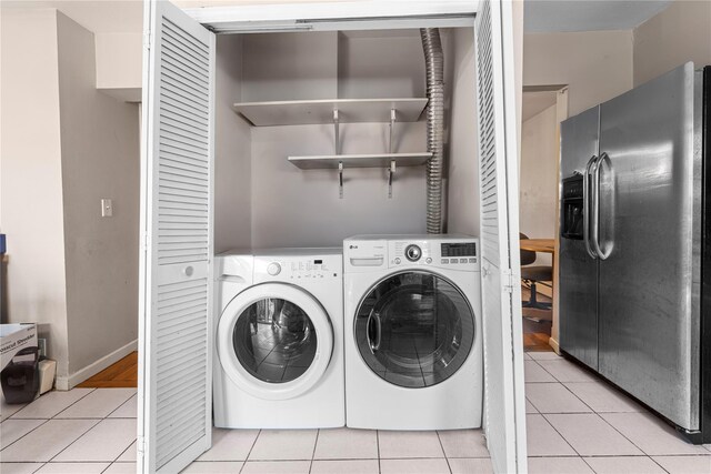 120-15 Cove Ct Unit 90A, College Point, NY 11356 - laundry area with light tile patterned floors and independent washer and dryer