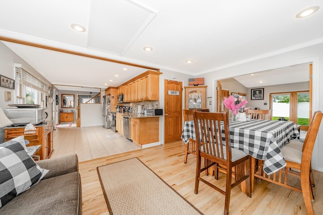 29 Water Ln N, Levittown, NY 11756 - dining area with healthy amount of natural light, light wood-type flooring, crown molding, and recessed lighting