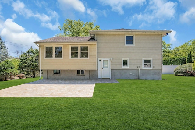 rear view of property featuring a patio area