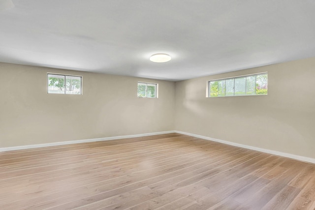 1 Pasture Ct, Commack, NY 11725 - below grade area featuring light wood-type flooring and baseboards