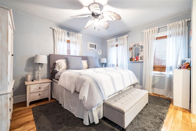 630 W Chester St, Long Beach, NY 11561 - bedroom featuring light wood-style floors, a ceiling fan, and baseboards