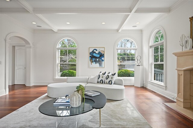52 Carriglea Dr, Call Listing Agent, CT 06878 - living room featuring plenty of natural light, wood finished floors, coffered ceiling, beam ceiling, and arched walkways