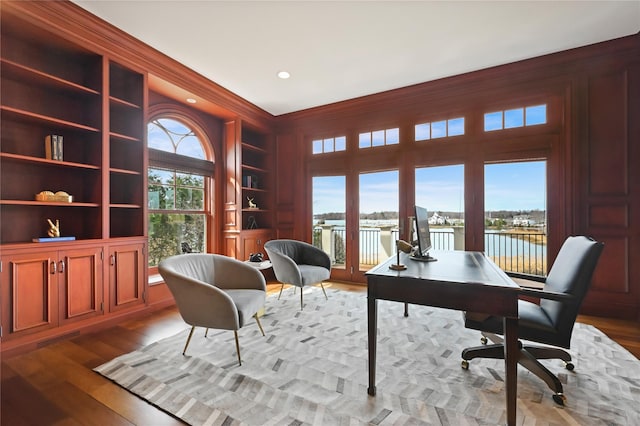 52 Carriglea Dr, Call Listing Agent, CT 06878 - office space with built in shelves, wood finished floors, and recessed lighting
