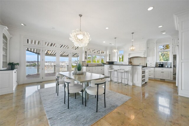 52 Carriglea Dr, Call Listing Agent, CT 06878 - dining room with recessed lighting, a chandelier, light tile patterned floors, and crown molding