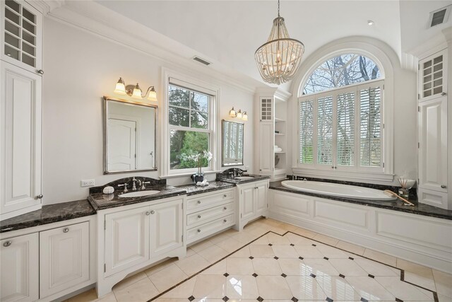 52 Carriglea Dr, Call Listing Agent, CT 06878 - bathroom featuring plenty of natural light, tile patterned floors, double vanity, and a bath