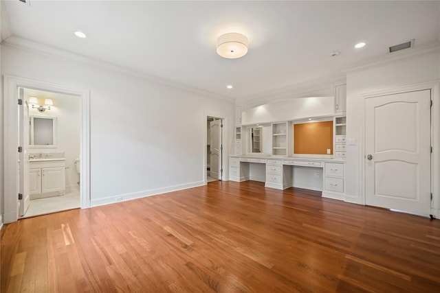 52 Carriglea Dr, Call Listing Agent, CT 06878 - unfurnished living room with crown molding, a sink, light wood-type flooring, baseboards, and recessed lighting