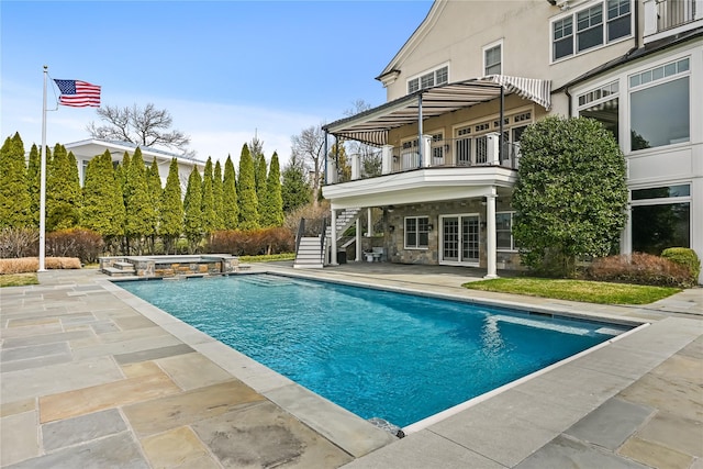 52 Carriglea Dr, Call Listing Agent, CT 06878 - view of swimming pool featuring stairway, a patio, and a pool with connected hot tub