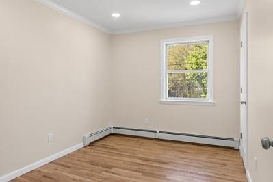8 Hilltop Ave, West Babylon, NY 11704 - empty room featuring crown molding, light wood-type flooring, baseboards, baseboard heating, and recessed lighting